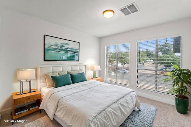 909 Reinli St Unit 101, Austin, TX 78751 - carpeted bedroom featuring baseboards