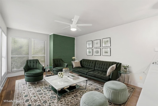 909 Reinli St Unit 101, Austin, TX 78751 - living area with a ceiling fan and wood finished floors