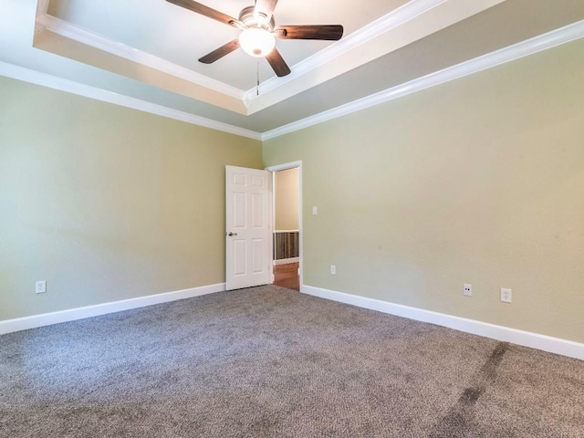 119 E Wiamea Ct, Bastrop, TX 78602 - carpeted spare room featuring a raised ceiling, crown molding, and a ceiling fan