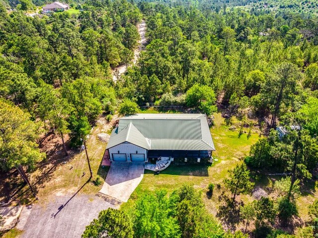 119 E Wiamea Ct, Bastrop, TX 78602 - view of subject property featuring a forest