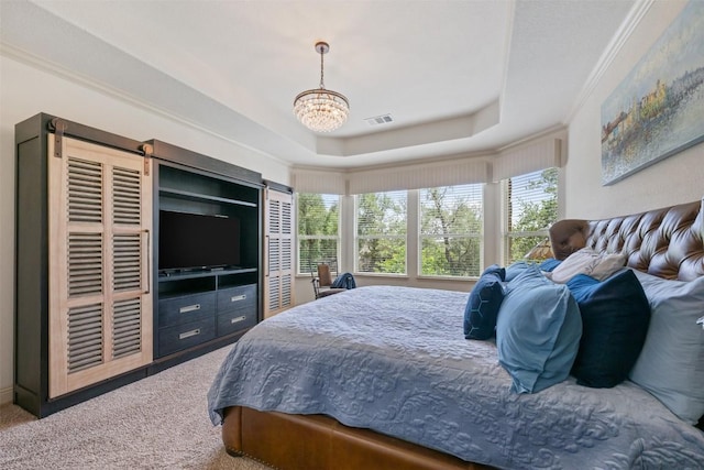100 Royal Oak Dr, Georgetown, TX 78628 - bedroom with multiple windows, carpet, a raised ceiling, a chandelier, and crown molding