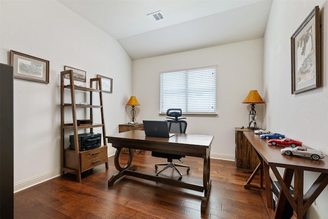 100 Royal Oak Dr, Georgetown, TX 78628 - office area with vaulted ceiling, dark wood finished floors, and baseboards
