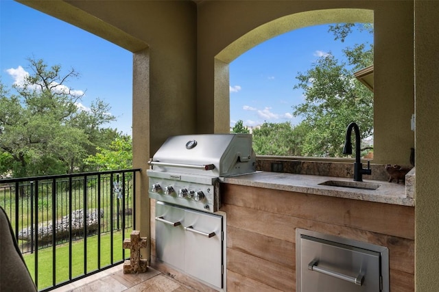 100 Royal Oak Dr, Georgetown, TX 78628 - view of patio / terrace featuring a sink, area for grilling, and exterior kitchen