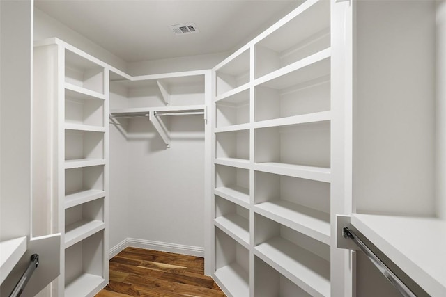 210 Hazeltine Dr, Lakeway, TX 78734 - spacious closet with dark wood-type flooring