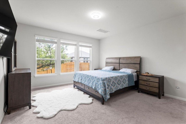128 Green Knoll Ln, Georgetown, TX 78628 - carpeted bedroom featuring baseboards