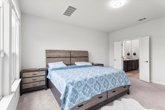 128 Green Knoll Ln, Georgetown, TX 78628 - carpeted bedroom featuring connected bathroom and baseboards