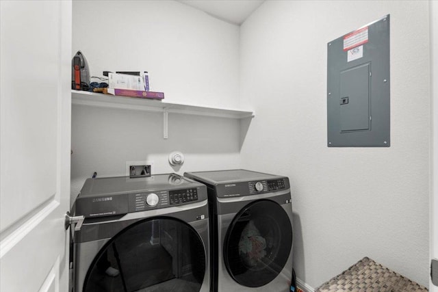 128 Green Knoll Ln, Georgetown, TX 78628 - laundry room featuring electric panel and washing machine and clothes dryer