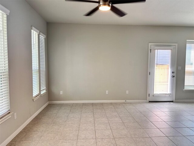 137 Rustic Glen Dr, San Marcos, TX 78666 - unfurnished room featuring ceiling fan, healthy amount of natural light, and light tile patterned floors