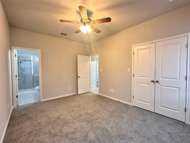 137 Rustic Glen Dr, San Marcos, TX 78666 - unfurnished bedroom with carpet, a closet, baseboards, ensuite bathroom, and ceiling fan