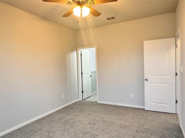 137 Rustic Glen Dr, San Marcos, TX 78666 - unfurnished bedroom featuring carpet flooring, baseboards, and ceiling fan