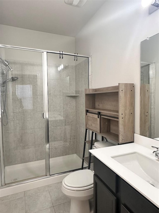 137 Rustic Glen Dr, San Marcos, TX 78666 - bathroom with a shower stall, tile patterned floors, toilet, and vanity