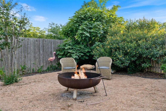 8304 Avocet Dr, Austin, TX 78745 - view of patio / terrace featuring a fire pit