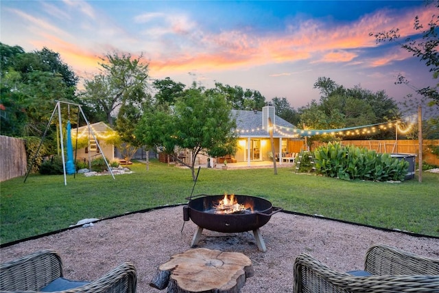 8304 Avocet Dr, Austin, TX 78745 - view of yard featuring a fire pit and a playground