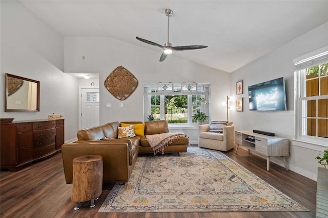 living area featuring lofted ceiling, wood finished floors, ceiling fan, and baseboards