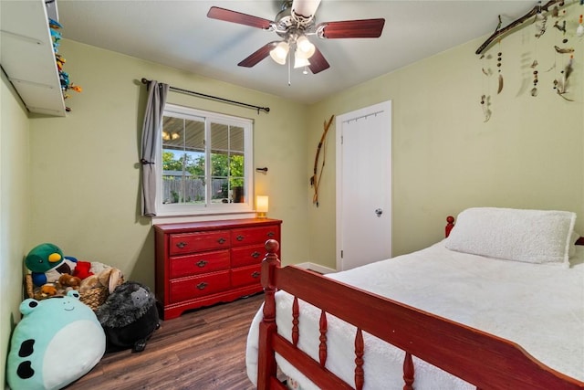 8304 Avocet Dr, Austin, TX 78745 - bedroom with dark wood-style flooring and ceiling fan
