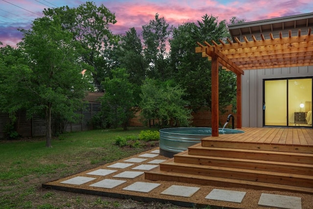 1811 Rogge Ln, Austin, TX 78723 - deck at dusk with a hot tub and a pergola