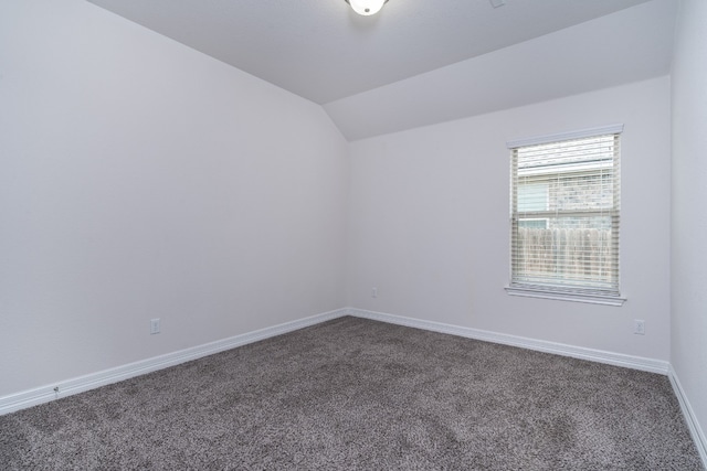 212 Beretta Cir, Georgetown, TX 78628 - carpeted spare room featuring vaulted ceiling and baseboards