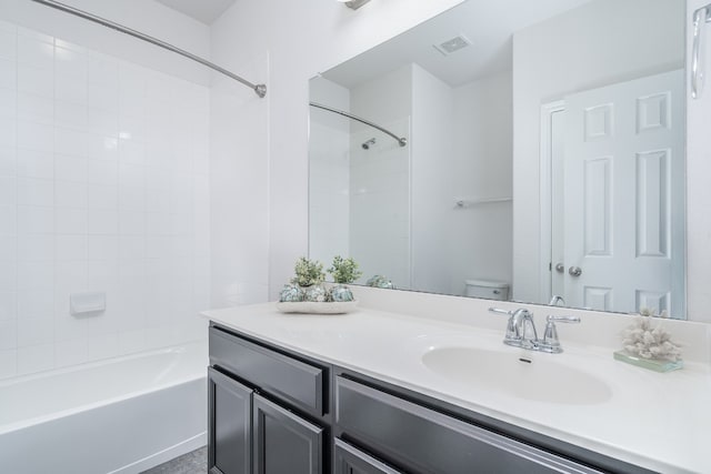 212 Beretta Cir, Georgetown, TX 78628 - bathroom with toilet, vanity, and bathing tub / shower combination