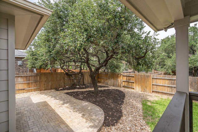 212 Beretta Cir, Georgetown, TX 78628 - fenced backyard featuring a patio