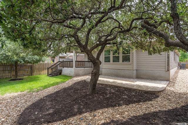 212 Beretta Cir, Georgetown, TX 78628 - view of yard with fence and central AC unit