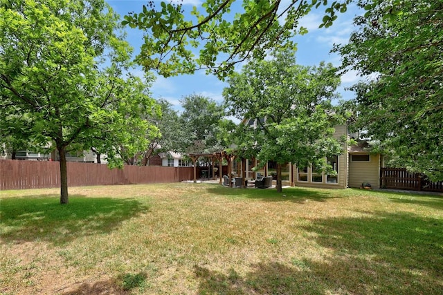 view of yard with a pergola
