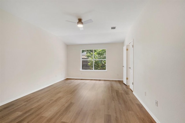 3306 Grasshopper Dr, Austin, TX 78748 - unfurnished room featuring light wood-style flooring, a ceiling fan, and baseboards