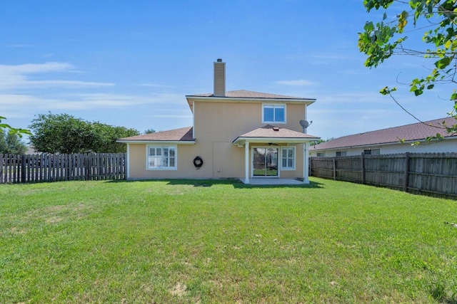 127 Edison Dr, Hutto, TX 78634 - back of house with a chimney