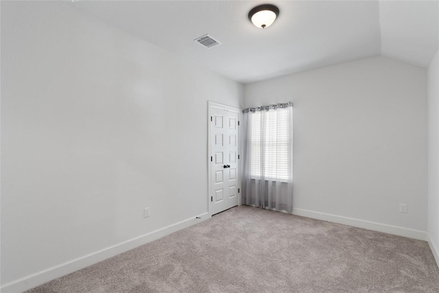 12915 Stanford Dr Unit 65, Austin, TX 78748 - carpeted spare room featuring baseboards and lofted ceiling