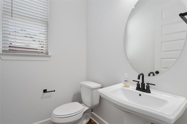 12915 Stanford Dr Unit 65, Austin, TX 78748 - half bath featuring a sink and baseboards