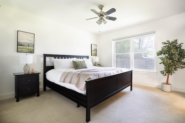 1805 Westmoor Dr, Austin, TX 78723 - bedroom with light colored carpet, baseboards, and ceiling fan