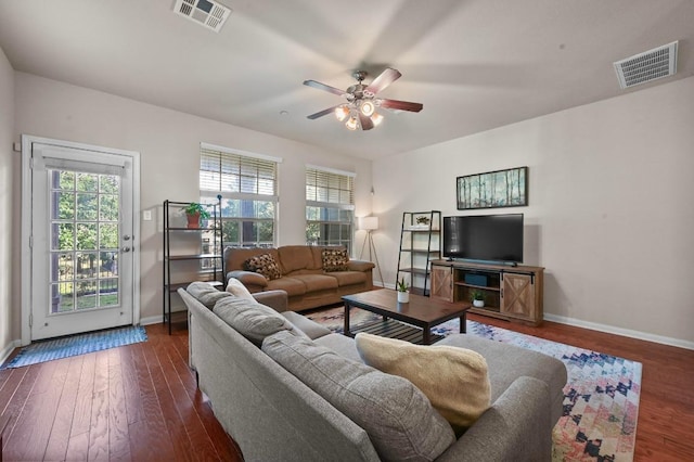3101 Davis Ln Unit 6402, Austin, TX 78748 - living area featuring ceiling fan, baseboards, and dark wood-style flooring