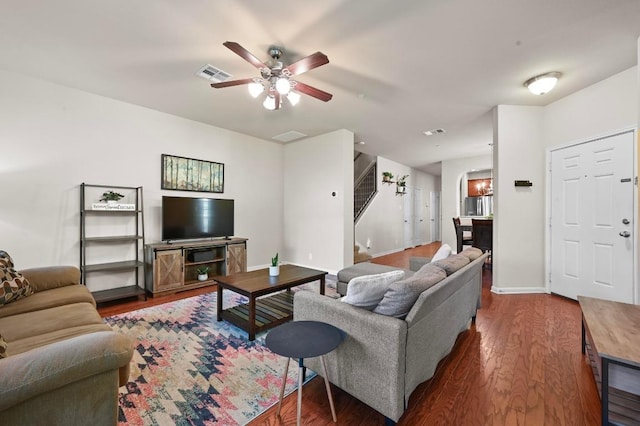 3101 Davis Ln Unit 6402, Austin, TX 78748 - living room featuring ceiling fan, wood finished floors, baseboards, and stairway