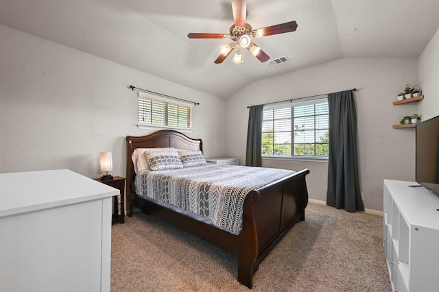 3101 Davis Ln Unit 6402, Austin, TX 78748 - bedroom with multiple windows, light carpet, lofted ceiling, ceiling fan, and baseboards