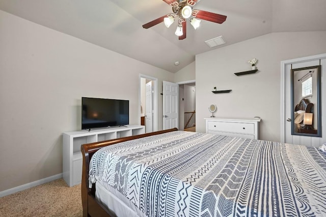 3101 Davis Ln Unit 6402, Austin, TX 78748 - bedroom featuring lofted ceiling, light carpet, baseboards, and a ceiling fan