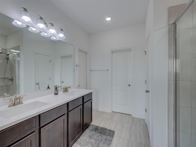 617 Silent Creek Cv, Georgetown, TX 78628 - bathroom with a stall shower and double vanity