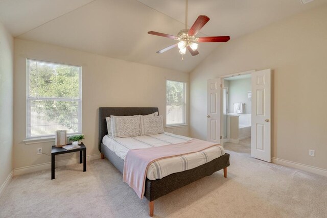 bedroom with light carpet, baseboards, ceiling fan, and high vaulted ceiling