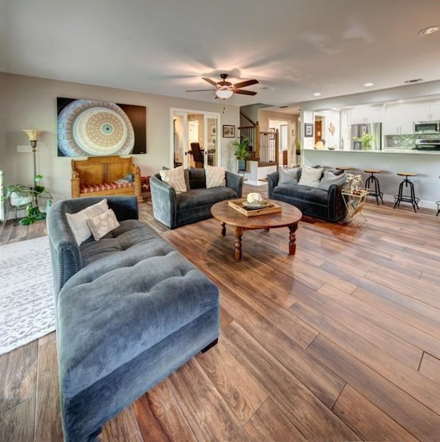 11408 Spicewood Pkwy, Austin, TX 78750 - living area featuring a ceiling fan, wood finished floors, and recessed lighting