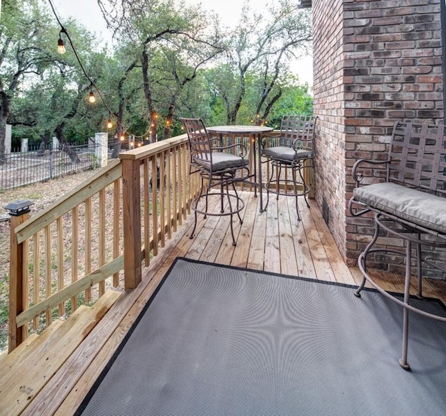 11408 Spicewood Pkwy, Austin, TX 78750 - wooden terrace with outdoor dining space