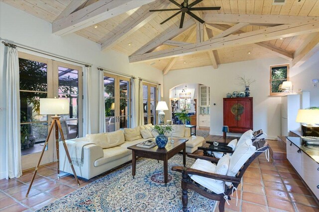 698 Windsong Trl, West Lake Hills, TX 78746 - tiled living area featuring wooden ceiling, arched walkways, beamed ceiling, high vaulted ceiling, and ceiling fan