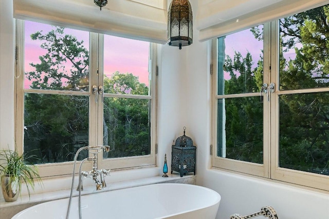 698 Windsong Trl, West Lake Hills, TX 78746 - bathroom with a freestanding bath and a sink