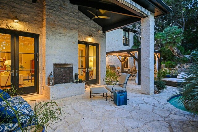 698 Windsong Trl, West Lake Hills, TX 78746 - view of patio with french doors, a ceiling fan, and exterior kitchen