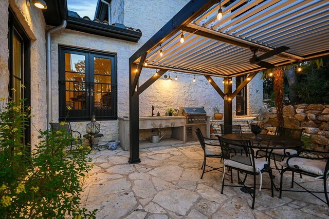 698 Windsong Trl, West Lake Hills, TX 78746 - view of patio featuring a pergola, outdoor dining space, area for grilling, french doors, and a sink