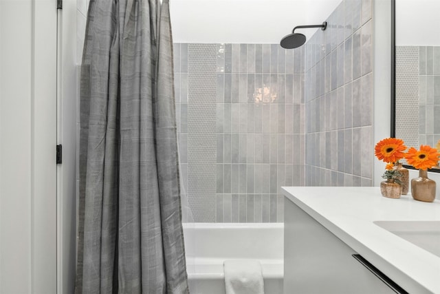 full bathroom featuring shower / bathtub combination with curtain, vanity, and tile walls