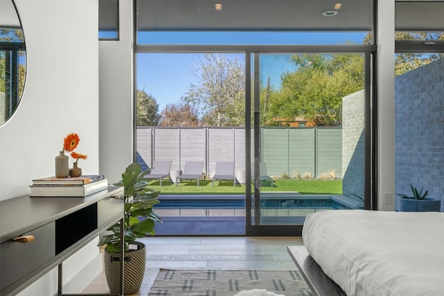 bedroom featuring wood finished floors