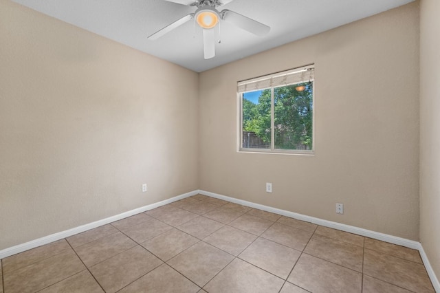 141 Britni Loop, Kyle, TX 78640 - unfurnished room with light tile patterned flooring, ceiling fan, and baseboards