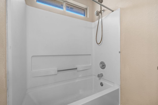 141 Britni Loop, Kyle, TX 78640 - bathroom with tub / shower combination