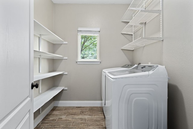 112 Mcleod, Cedar Creek, TX 78612 - laundry area with washer and dryer, wood finish floors, and baseboards