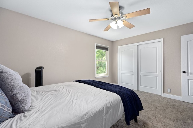 112 Mcleod, Cedar Creek, TX 78612 - carpeted bedroom with a closet, baseboards, and ceiling fan