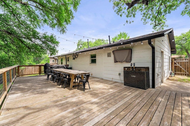 1302 Astor Pl, Austin, TX 78721 - wooden deck featuring outdoor dining space