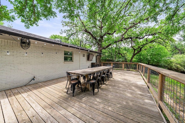 1302 Astor Pl, Austin, TX 78721 - wooden deck featuring outdoor dining area